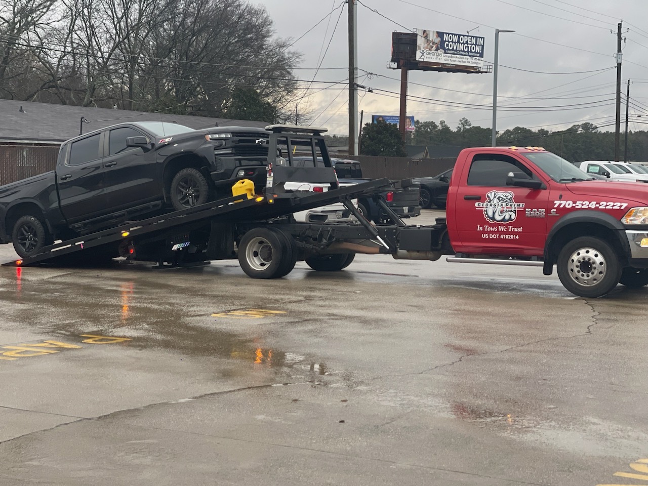 Our flatbed tow truck doing the action in Conyers, GA.